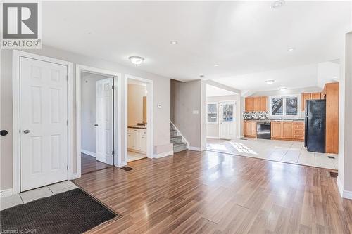 Unfurnished living room with light tile patterned flooring and recessed lighting - 20 East 27Th Street, Hamilton, ON - Indoor