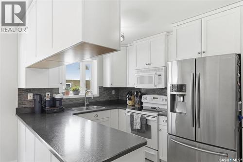 266 Chitek Terrace, Saskatoon, SK - Indoor Photo Showing Kitchen With Double Sink
