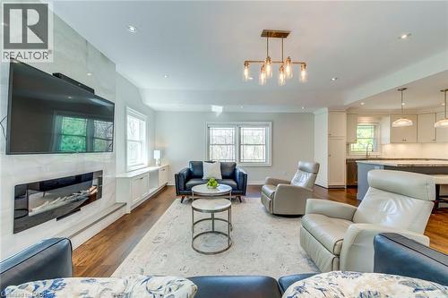 4306 Lakeshore Road, Burlington, ON - Indoor Photo Showing Living Room With Fireplace