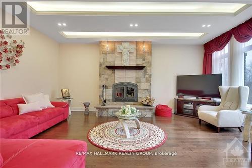 699 Ballycastle Crescent, Ottawa, ON - Indoor Photo Showing Living Room With Fireplace