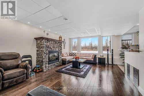 699 Ballycastle Crescent, Ottawa, ON - Indoor Photo Showing Living Room With Fireplace