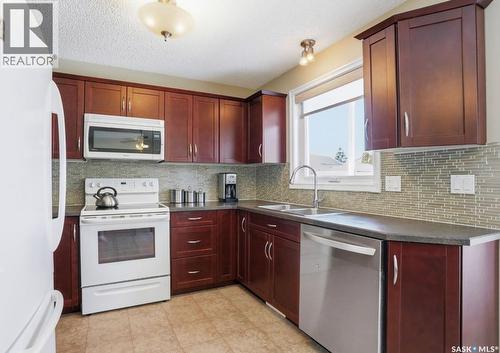 403 Bronson Crescent, Saskatoon, SK - Indoor Photo Showing Kitchen With Double Sink