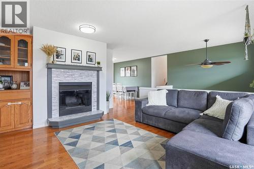 6719 Maplecrest Place, Regina, SK - Indoor Photo Showing Living Room With Fireplace
