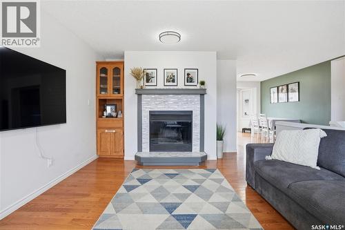 6719 Maplecrest Place, Regina, SK - Indoor Photo Showing Living Room With Fireplace