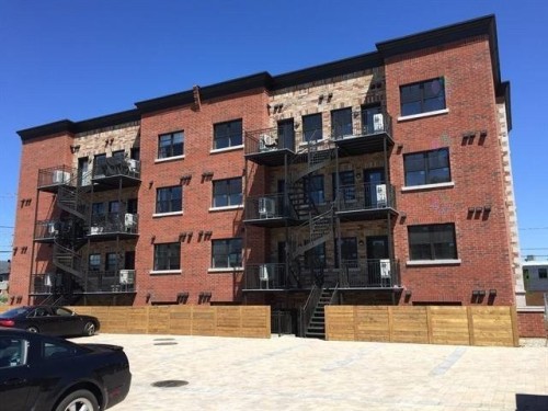 Parking - 101-2035 Rue Notre-Dame, Montréal (Lachine), QC - Outdoor With Balcony With Facade