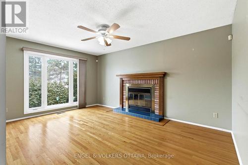 3 Balding Crescent, Ottawa, ON - Indoor Photo Showing Living Room With Fireplace