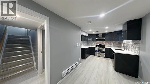 1607 9Th Avenue N, Saskatoon, SK - Indoor Photo Showing Kitchen With Upgraded Kitchen
