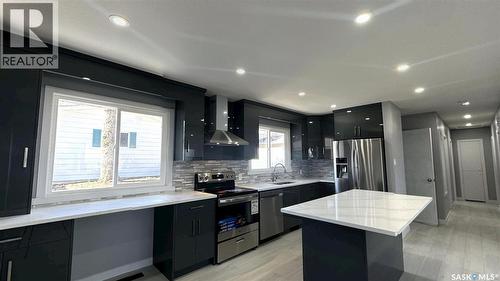 1607 9Th Avenue N, Saskatoon, SK - Indoor Photo Showing Kitchen With Upgraded Kitchen