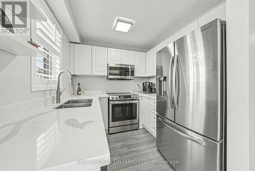 2259 Seton Crescent, Burlington, ON - Indoor Photo Showing Kitchen With Double Sink