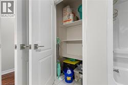 View of bathroom storage closet. - 