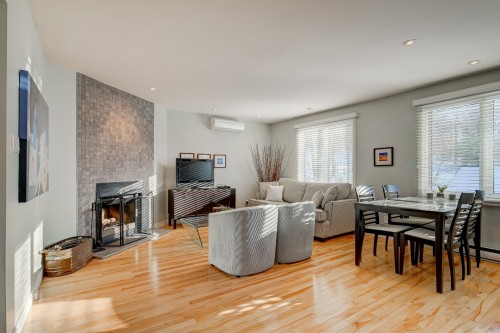 Vue d'ensemble - 161C Rue Montcalm, Bromont, QC - Indoor Photo Showing Living Room With Fireplace