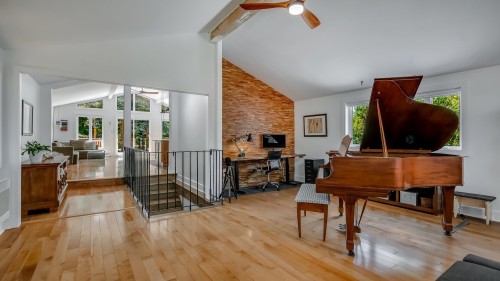 Salle familiale - 315 Rue Des Sables, Otterburn Park, QC - Indoor