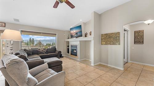 5190 Cobble Crescent, Kelowna, BC - Indoor Photo Showing Living Room With Fireplace
