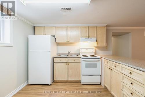 18 Newton Street, Barrie, ON - Indoor Photo Showing Kitchen With Double Sink