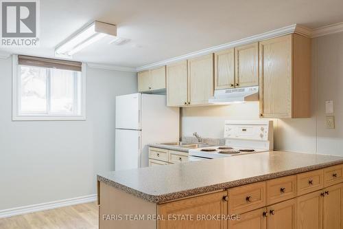 18 Newton Street, Barrie, ON - Indoor Photo Showing Kitchen With Double Sink