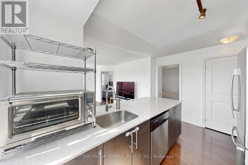 Gourmet Kitchen features Stone Countertops - #710 - 125 Western Battery Road, Toronto, ON - Indoor Photo Showing Kitchen