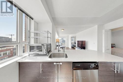 Gourmet Kitchen features Stone Countertops - #710 - 125 Western Battery Road, Toronto, ON - Indoor Photo Showing Kitchen