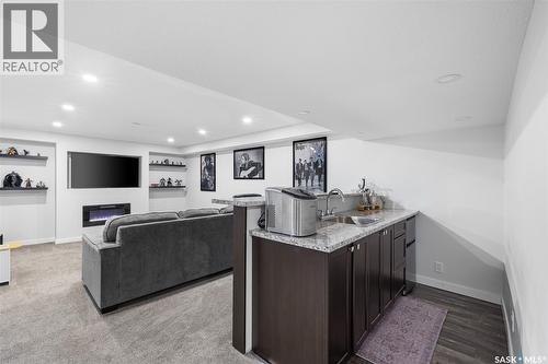 15 Thistle Bay, Regina, SK - Indoor With Fireplace