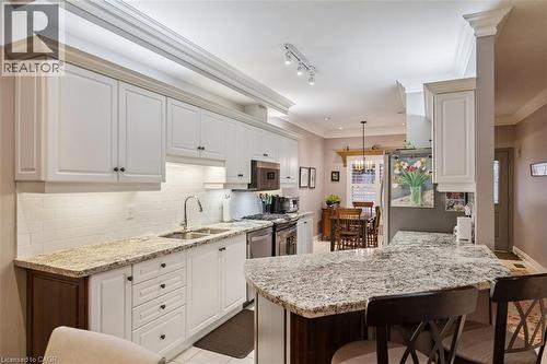 Breakfast Bar! - 1019 North Shore Boulevard E Unit# 3, Burlington, ON - Indoor Photo Showing Kitchen With Double Sink With Upgraded Kitchen