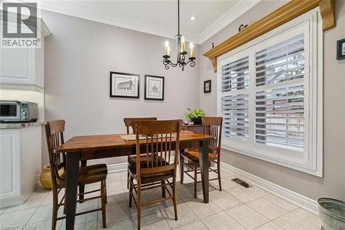 Large Breakfast Area with California Shutters! - 1019 North Shore Boulevard E Unit# 3, Burlington, ON - Indoor Photo Showing Dining Room
