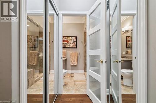 Mirrored His/Her Closets! - 1019 North Shore Boulevard E Unit# 3, Burlington, ON - Indoor