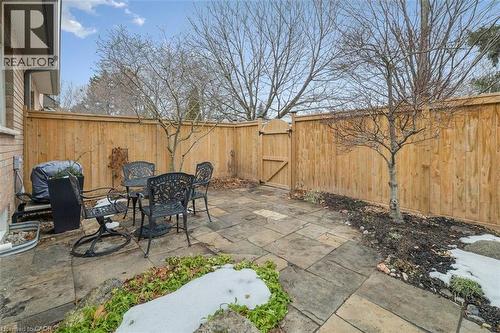 Large, private patio with New Fence 2025! - 1019 North Shore Boulevard E Unit# 3, Burlington, ON - Outdoor With Deck Patio Veranda