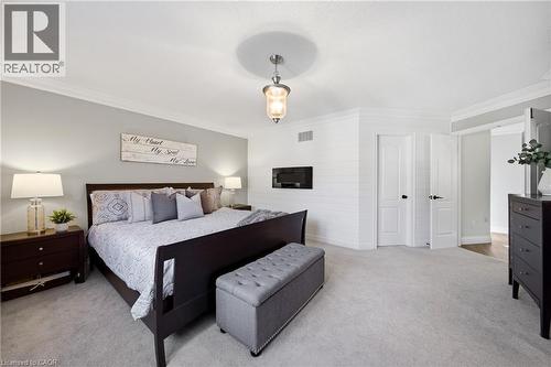 Bedroom with ornamental molding and carpet flooring - 4670 Bracknell Road, Burlington, ON - Indoor Photo Showing Bedroom