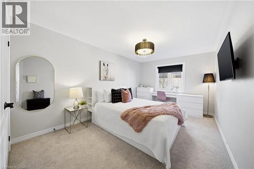 Bedroom featuring light colored carpet - 4670 Bracknell Road, Burlington, ON - Indoor Photo Showing Bedroom
