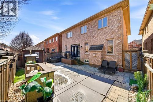 Back of property featuring a fenced backyard, a patio area, brick siding, and a gate - 4670 Bracknell Road, Burlington, ON - Outdoor With Deck Patio Veranda With Exterior