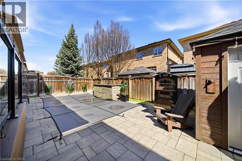 Fenced backyard with a patio - 4670 Bracknell Road, Burlington, ON - Outdoor