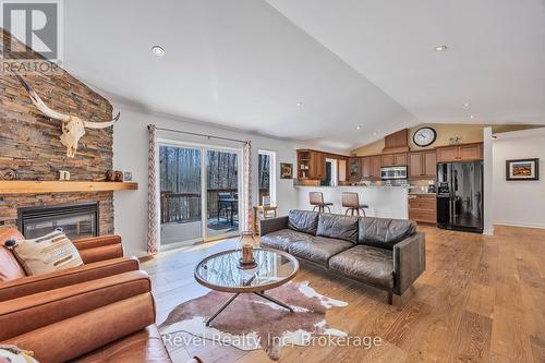 89 Trout Lane, Tiny, ON - Indoor Photo Showing Living Room With Fireplace