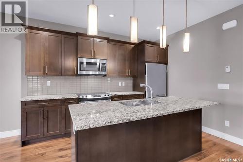 48 1550 Paton Crescent, Saskatoon, SK - Indoor Photo Showing Kitchen With Double Sink With Upgraded Kitchen