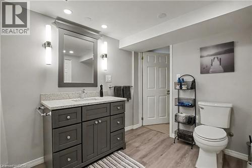 Bathroom featuring vanity, light wood-type flooring, and recessed lighting - 11 Carwyn Crescent, Hamilton, ON - Indoor Photo Showing Bathroom