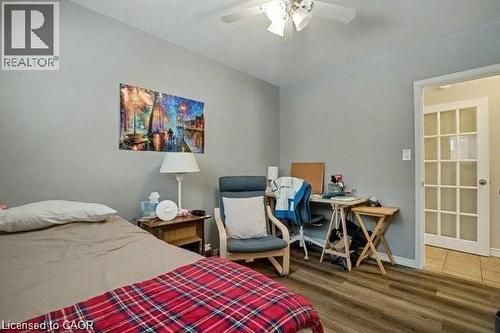 Bedroom with a ceiling fan and dark wood-style flooring - 11 Carwyn Crescent, Hamilton, ON - Indoor Photo Showing Bedroom