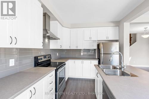 703 Samantha Eastop Avenue, Ottawa, ON - Indoor Photo Showing Kitchen With Double Sink