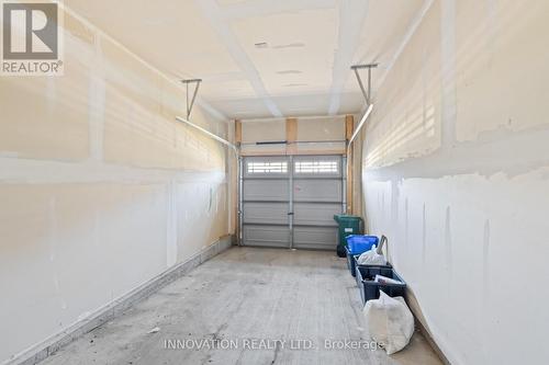 703 Samantha Eastop Avenue, Ottawa, ON - Indoor Photo Showing Garage