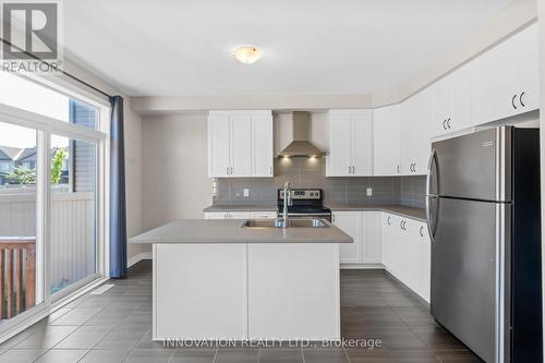703 Samantha Eastop Avenue, Ottawa, ON - Indoor Photo Showing Kitchen With Double Sink