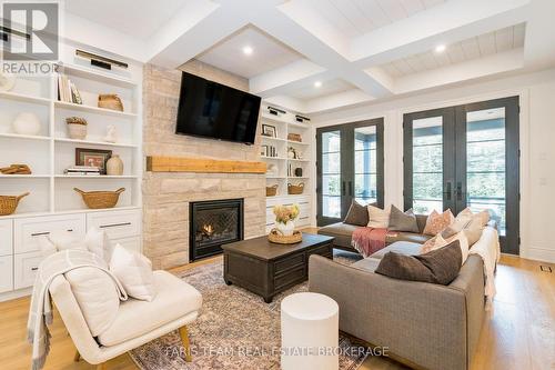 4 Sycamore Circle, Springwater, ON - Indoor Photo Showing Living Room With Fireplace