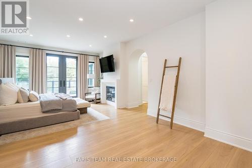 4 Sycamore Circle, Springwater, ON - Indoor With Fireplace