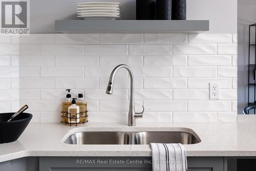 Photo is representation of Builders work - 218 Bridge Crescent, Minto, ON - Indoor Photo Showing Kitchen With Double Sink With Upgraded Kitchen