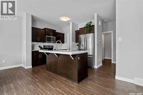 4810 Green Brooks Way E, Regina, SK - Indoor Photo Showing Kitchen With Stainless Steel Kitchen With Upgraded Kitchen