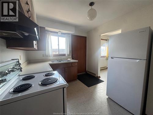 3027 Walker Road Unit# B, Windsor, ON - Indoor Photo Showing Kitchen With Double Sink