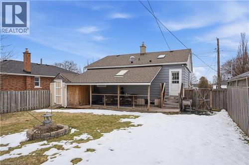 Fully fenced backyard complete with a wooden deck, storage shed & plenty of space to entertain. - 208 East 44Th Street, Hamilton, ON - Outdoor With Deck Patio Veranda