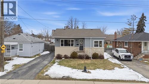Don't judge this book by its cover! Get inside this bungalow & FAST! Interior has been redone & will impress! - 208 East 44Th Street, Hamilton, ON - Outdoor