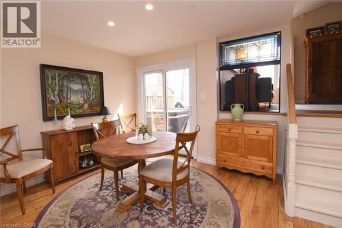 Dining area featuring patio doors conveniently leading to the backyard - 3200 Greenbough Crescent, Burlington, ON - Indoor Photo Showing Dining Room