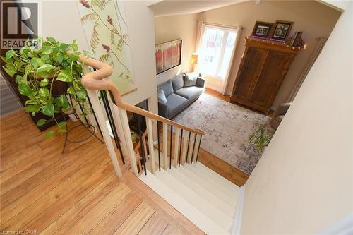 Staircase with wood-style floors - 3200 Greenbough Crescent, Burlington, ON - Indoor Photo Showing Other Room
