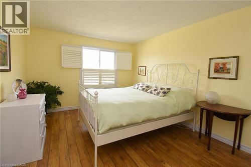 Third bedroom featuring large window with shutters - 3200 Greenbough Crescent, Burlington, ON - Indoor Photo Showing Bedroom