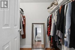 Primary bedroom offers walk in closet. - 