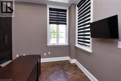 Unfurnished office with baseboards and parquet floors - 
