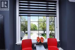 Entryway with healthy amount of natural light and a desk - 